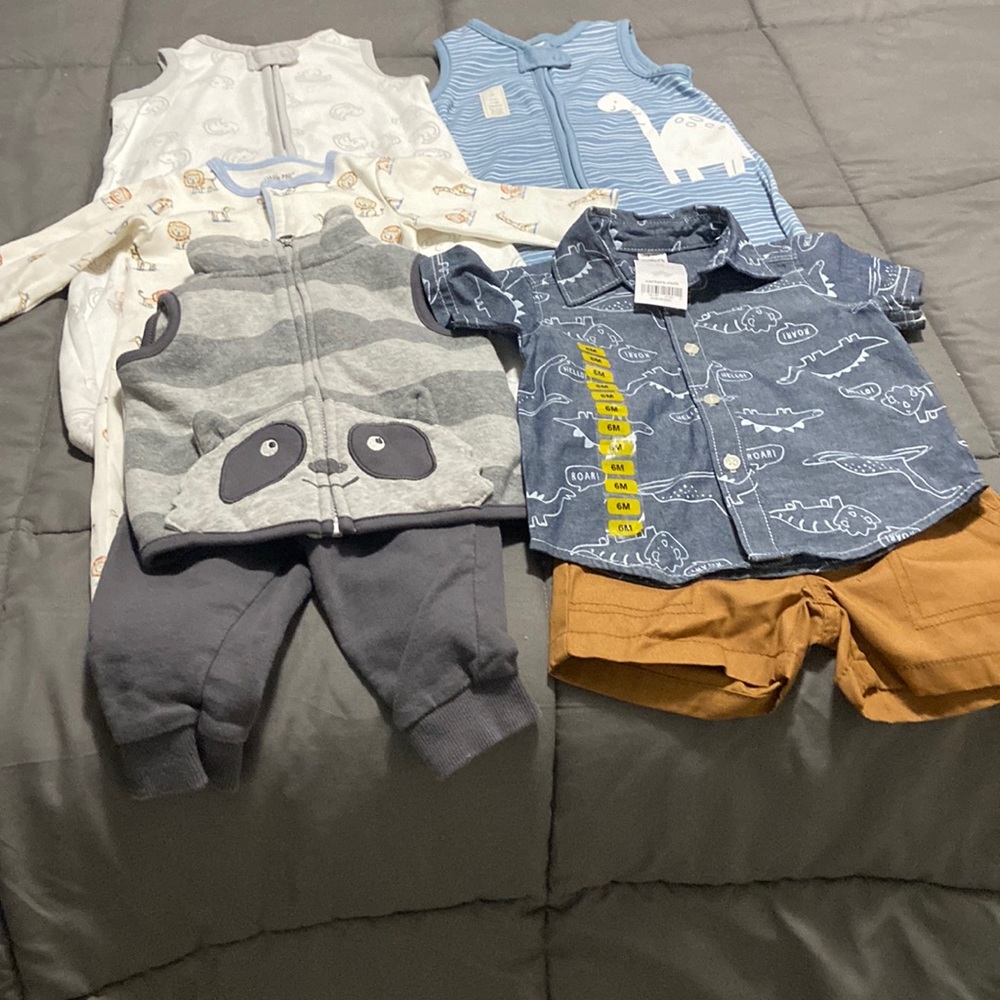 Bundle of baby clothes.